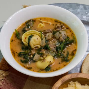 The feature image of one serving of soup in a white bowl.