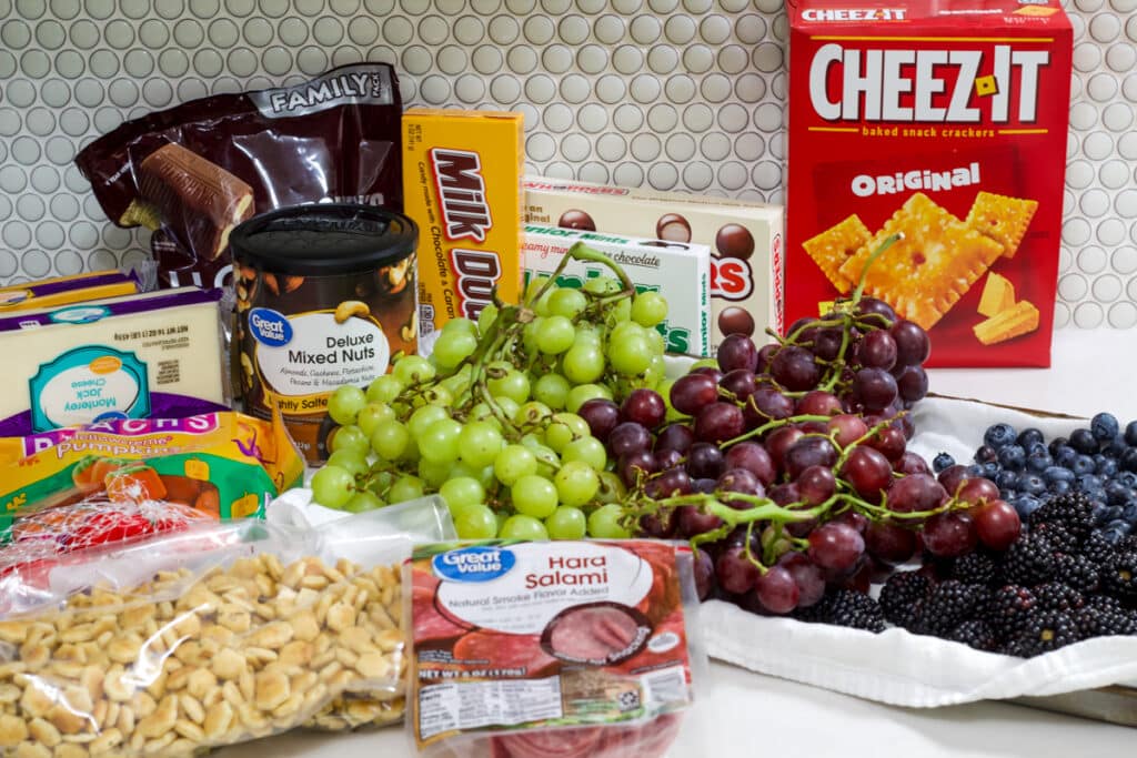 All of the ingredients needed to make the Fun and Easy Halloween Skull Charcuterie Board.