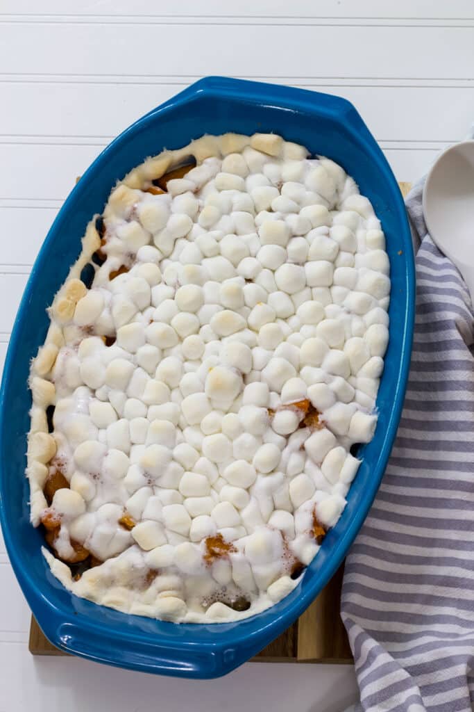 The casserole dish with the Sweet Potatoes (Yams) with Marshmallows in it before it had a serving removed.