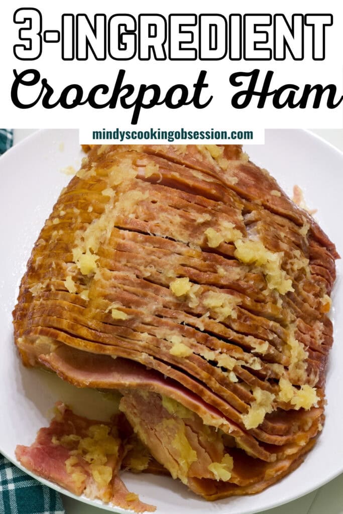 The whole cooked ham on a white plate, the recipe title in in text at the top so it can be pinned on Pinterest.