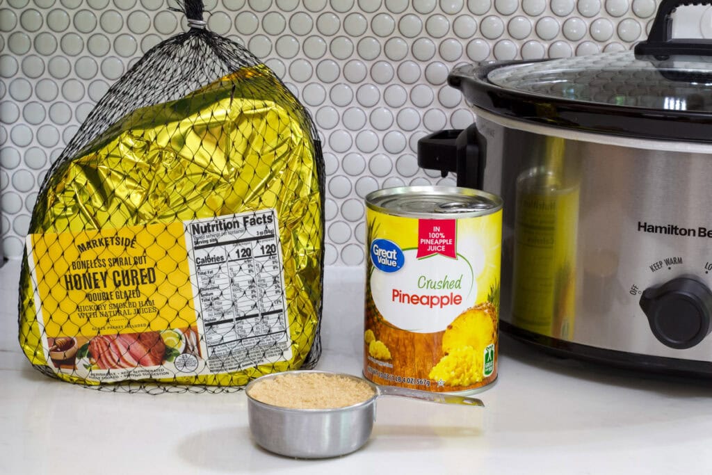 All of the ingredients need to make Best 3-ingredient Crockpot Ham Recipe and a slow cooker.