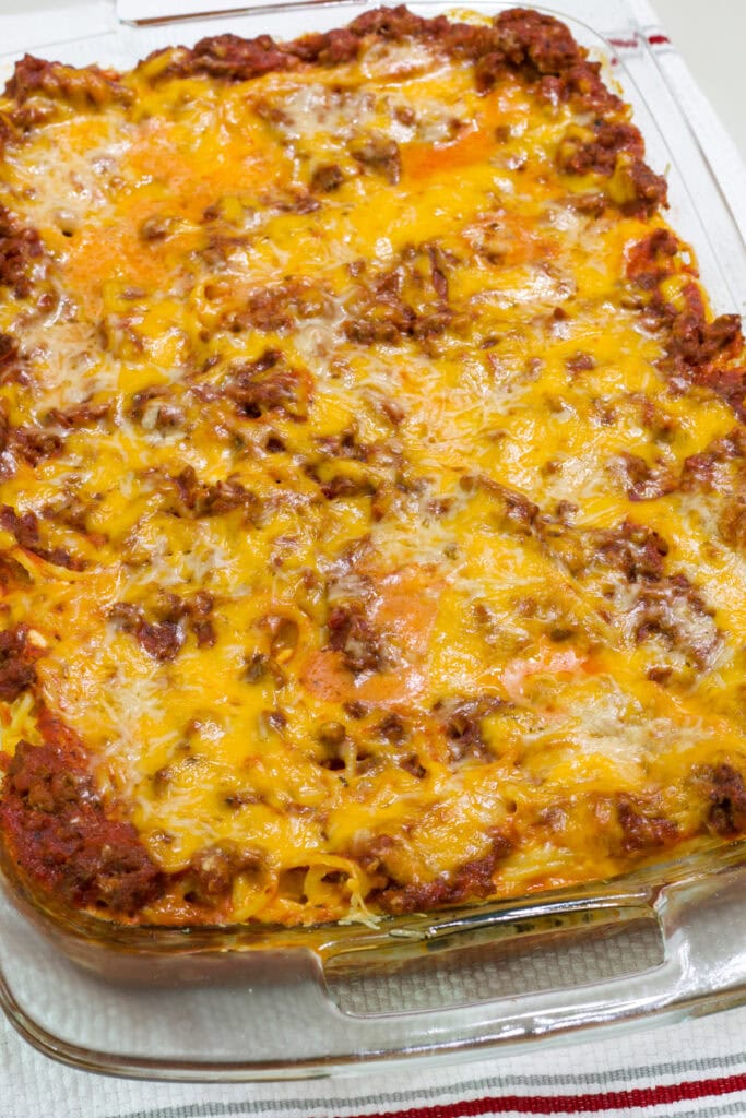 The whole uncut baked casserole in a glass baking dish.
