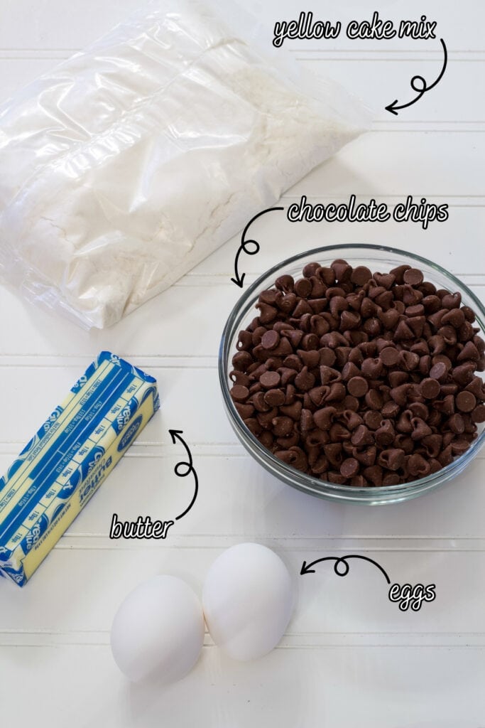 The cake mix, butter, eggs and chocolate chips needed to make the Cake Mix Cookie Bars.
