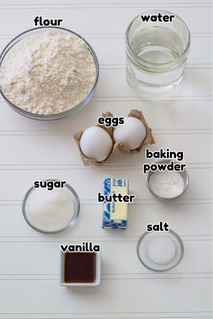 The ingredients needed to make the No Milk Homemade Pancakes labeled with text.