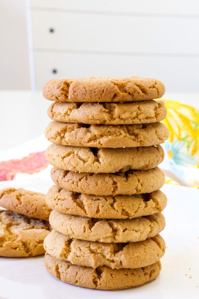 Nine Old-Fashioned Chewy Peanut Butter Cookies stacked on top of each other.