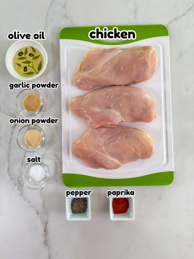 All of the ingredients measured out and ready to make the Baked Thin Chicken Breasts recipe.