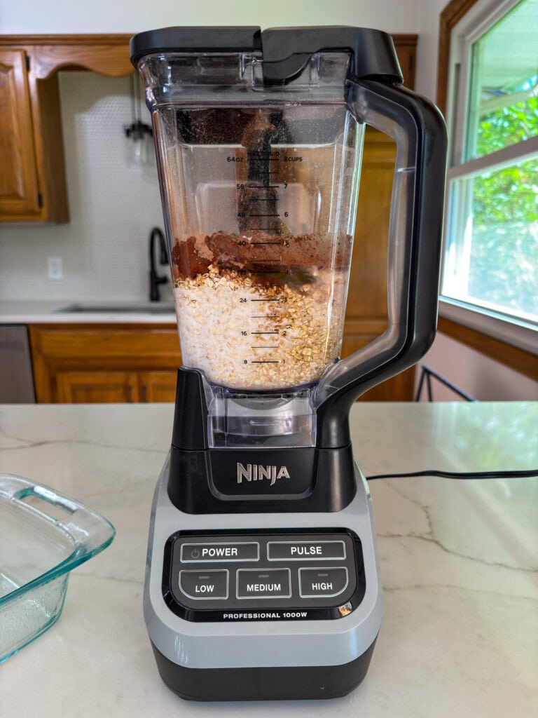 All of the ingredients except the chocolate chips in the blender ready to be blended.