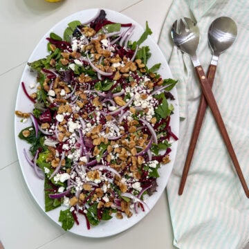 Overhead shot of the entire salad on a large white platter.