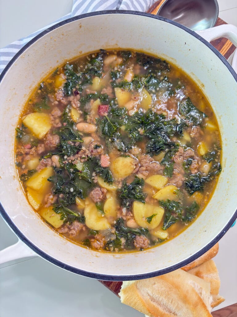 The entire batch of finished Dairy Free Zuppa Toscana in a large soup pot.