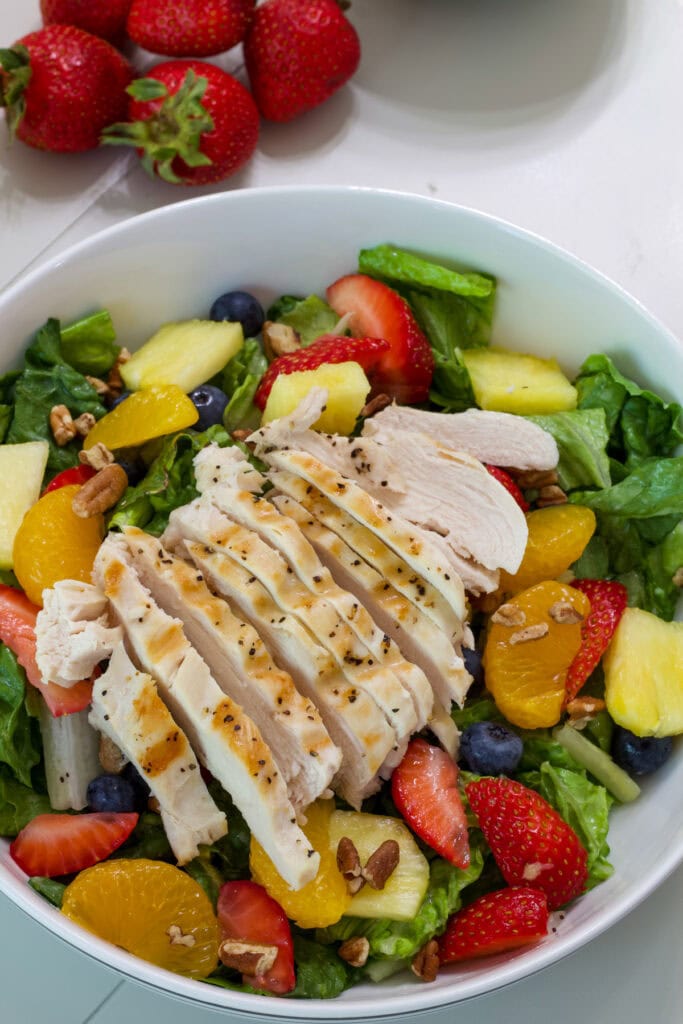 The finished Panera Strawberry Poppyseed Salad with Chicken ready to be eaten.