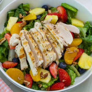 Feature image of the finished Panera Strawberry Poppyseed Salad with Chicken.