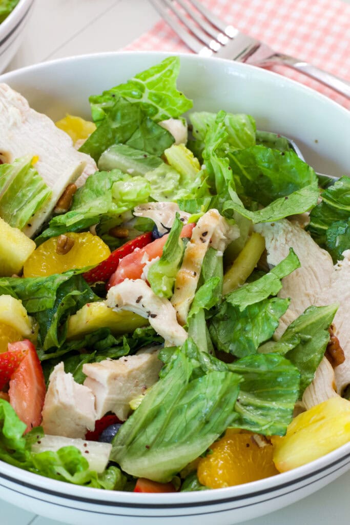 The Panera Strawberry Poppyseed Salad with Chicken after it's been mixed up.