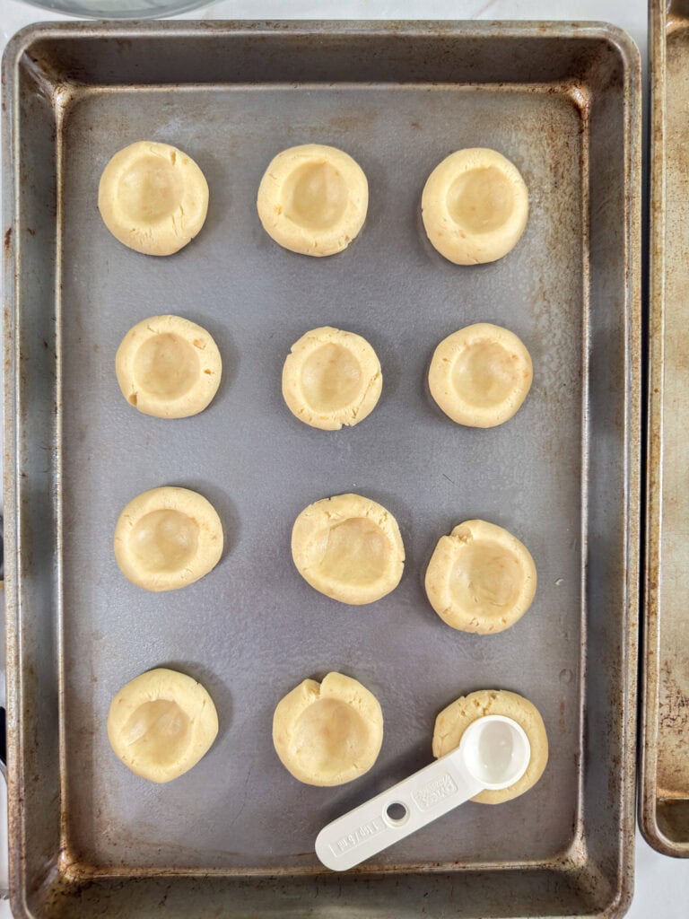 The indentation made into the cookies so they are ready to be filled.