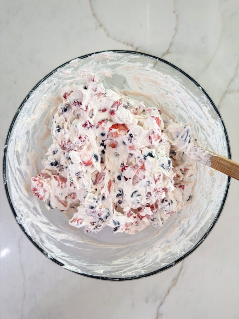 The finished Triple Berry Cheesecake Salad in the mixing bowl.