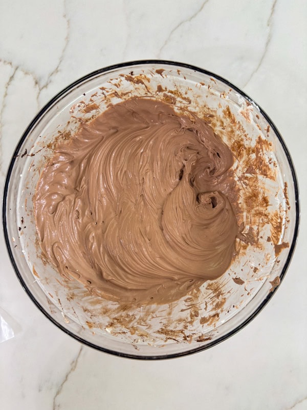 The whipped topping added to the milk and pudding mixture.