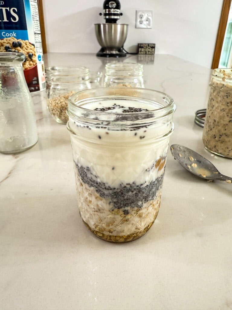 The milk added to the other ingredients in the jar.