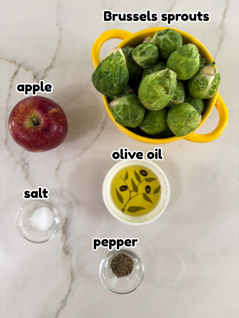 All of the ingredients needed to make the Oven Roasted Brussels Sprouts with Apples recipe.