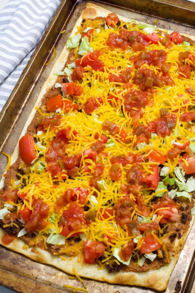 Overhead shot of the entire finished uncut Super Easy Taco Pizza.