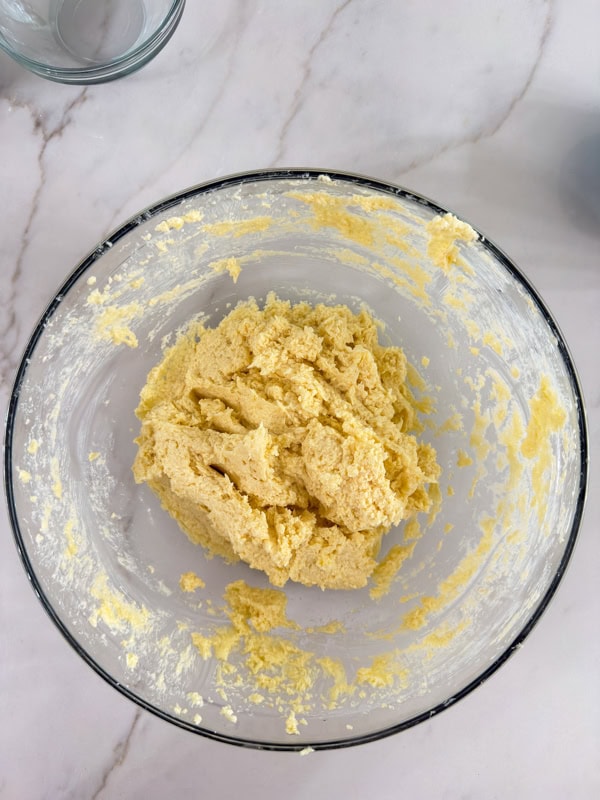 The milk egg and vanilla added to the butter mixture.