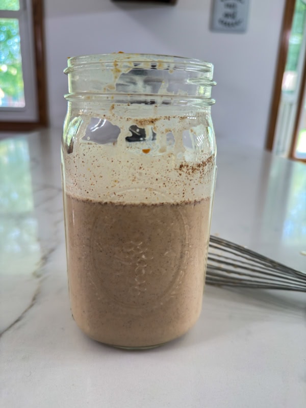 The ingredients in the jar after being whisked together.