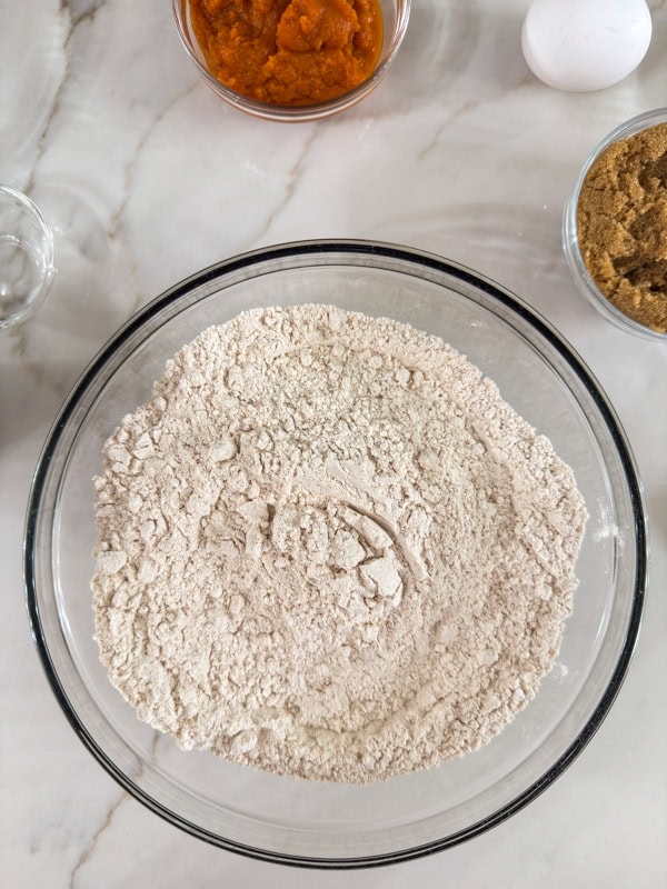 The dry ingredients mixed together in a large medium bowl.