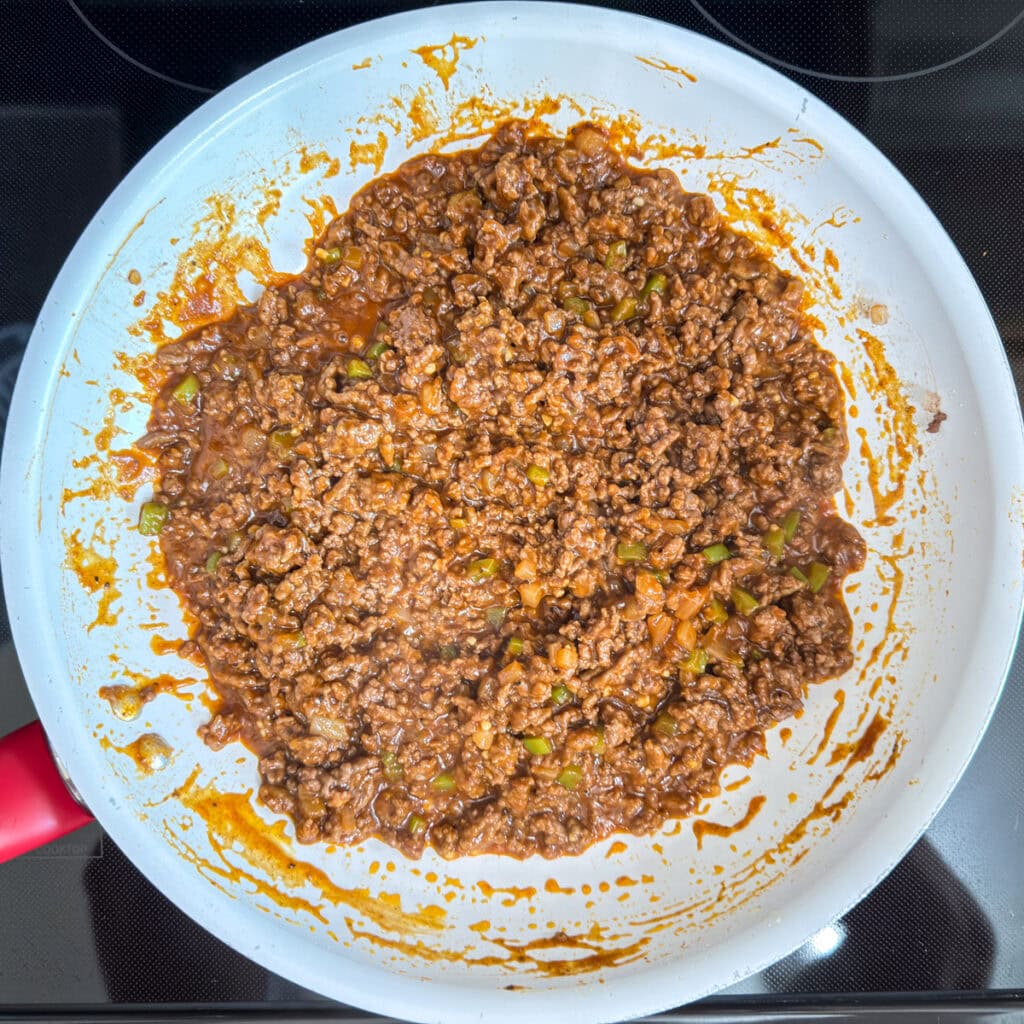 The finished sloppy joe meat mixture in a skillet.