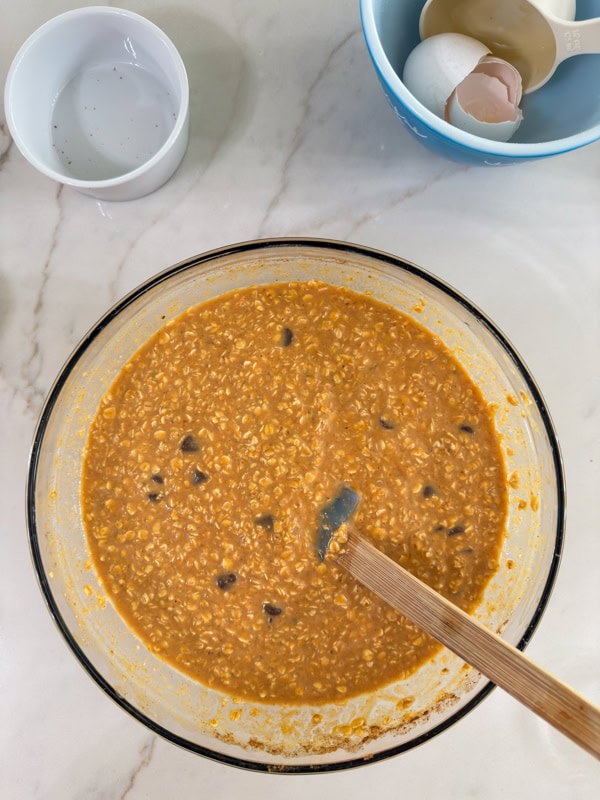 The batter mixed up in a large glass mixing bowl.