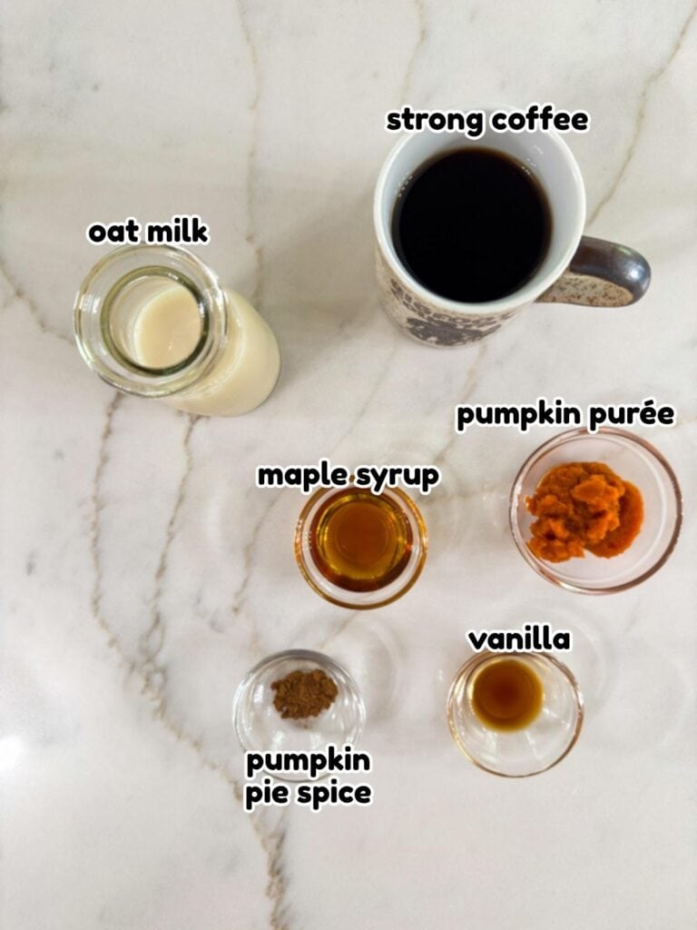 All of the ingredients needed to make the Pumpkin Spice Latte with Oat Milk recipe.