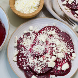Overhead shot of one serving of Roasted Beets with Feta on a plate.