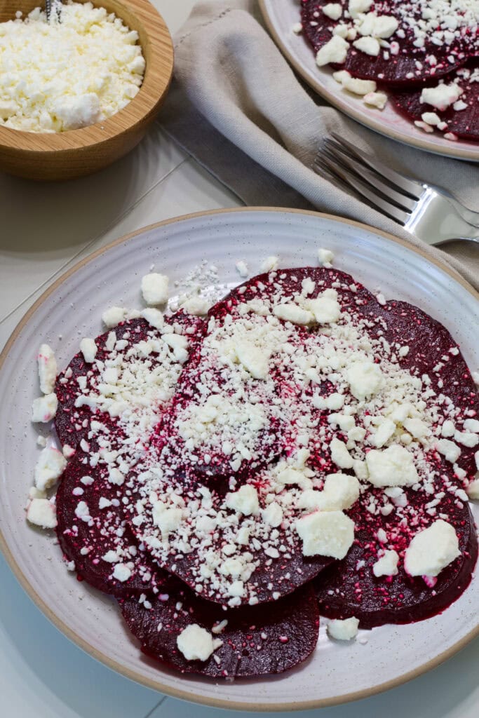 Overhead shot of one serving of Roasted Beets with Feta on a plate.