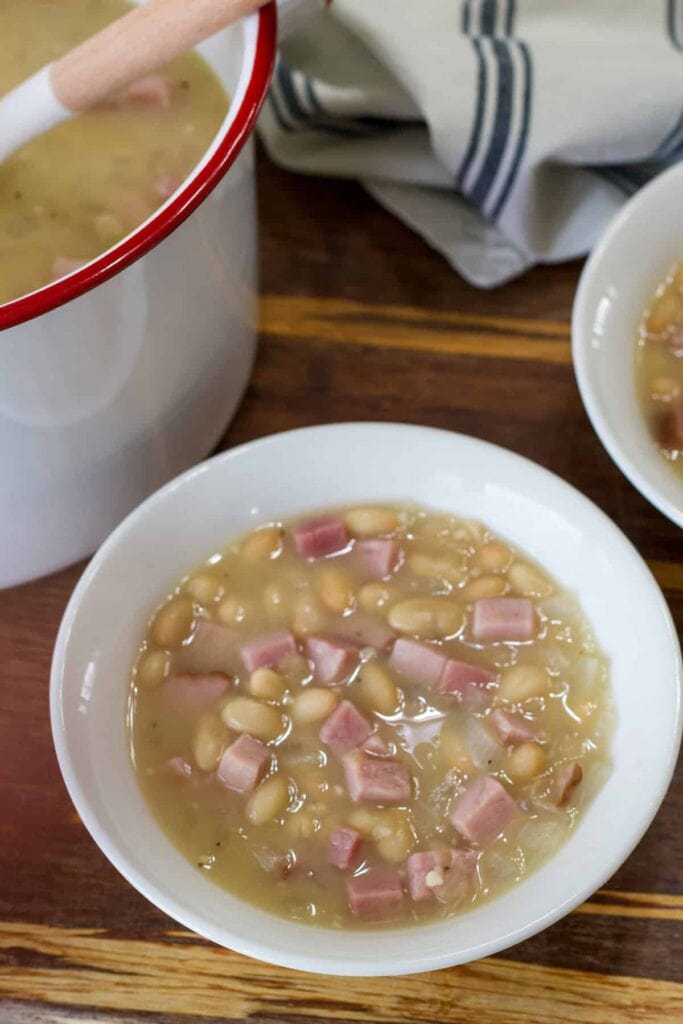 A bowl of 30-Minute White Beans with Ham (Easy One-Pot Comfort Food).