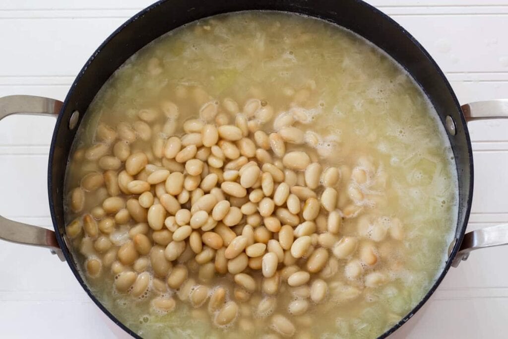 The beans added to the pot.