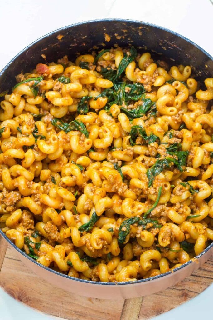 The finished Ground Beef Spinach Pasta in a dutch oven.