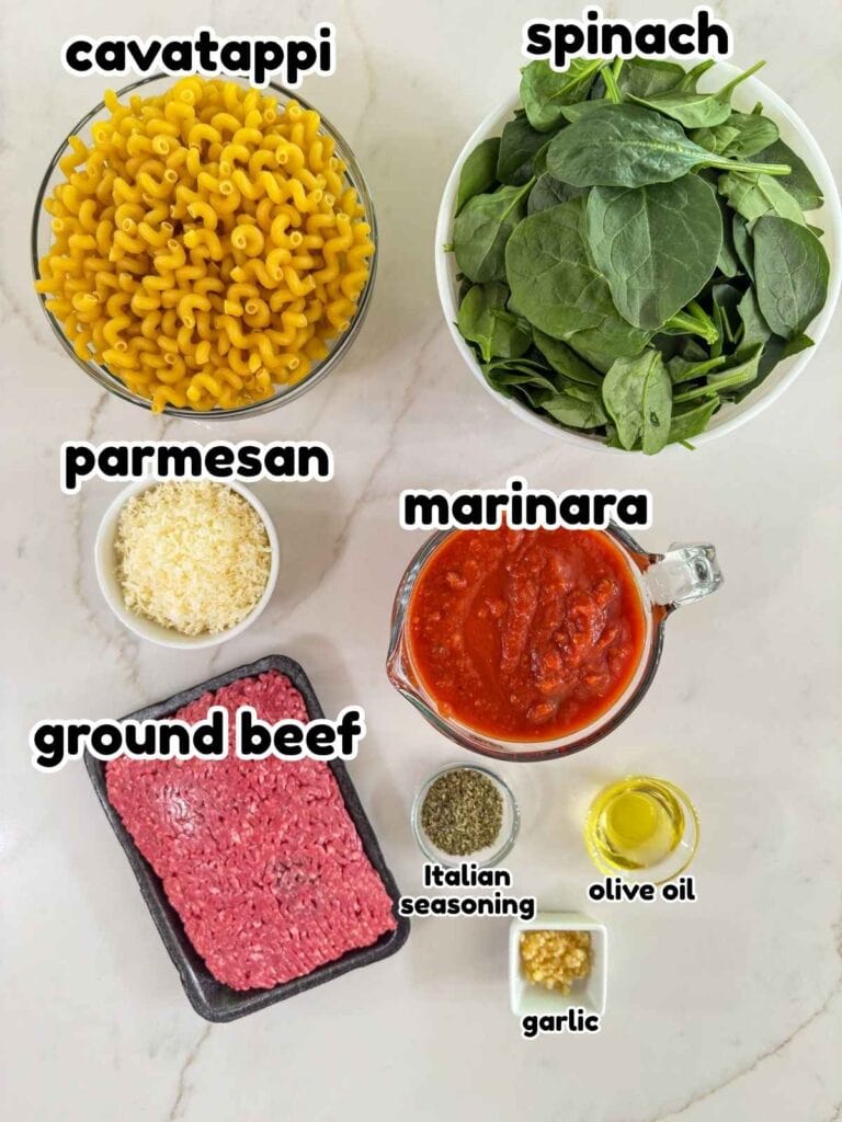 All of the ingredients needed to make the Ground Beef Spinach Pasta recipe.