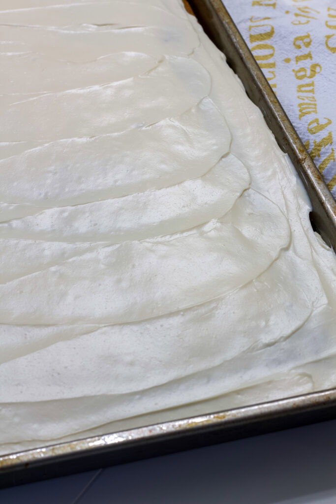 The frosted Healthy Pumpkin Cake in the sheet pan before being cut.