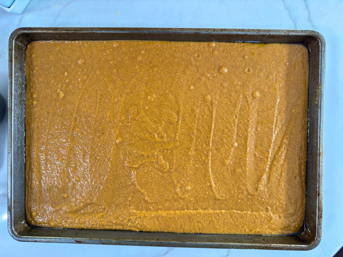 The cake batter in the pan ready to go into the oven.