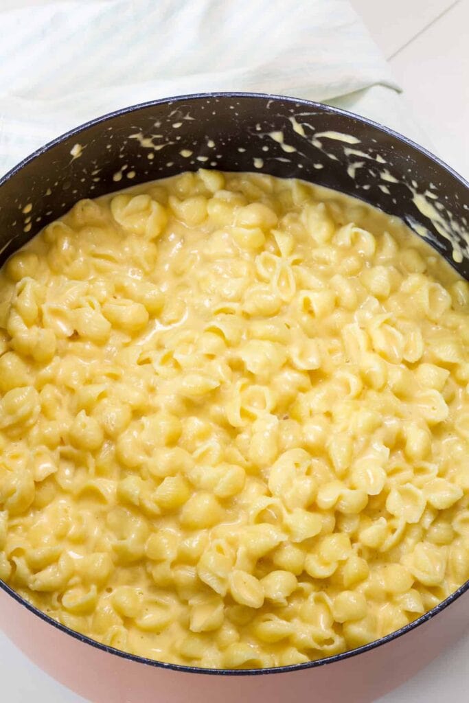 Overhead close up of a Dutch oven filled with the finished Mac and Cheese with Shells.