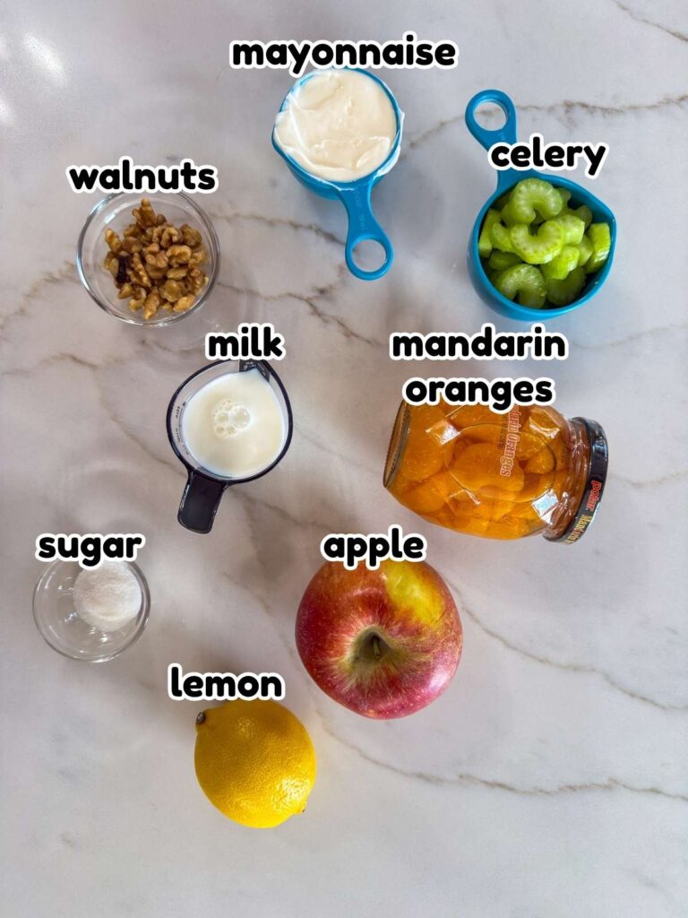 All of the ingredients needed to make the Mandarin Orange & Apple Salad recipe.