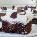 The side view of one piece of Peppermint Mocha Poke Cake.