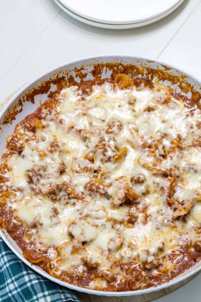 The entire batch of Homemade Hamburger Helper Lasagna in a skillet ready to be served.