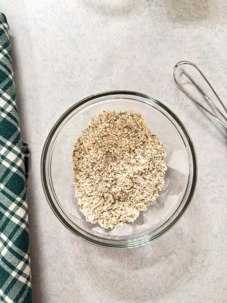 Spices and corn starch mixed in a small bowl.