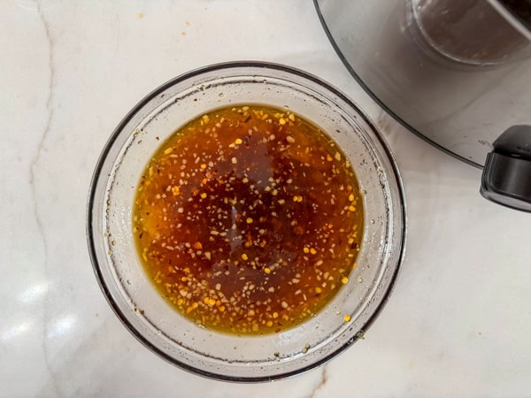 All of the sauce ingredients combined in a small bowl.