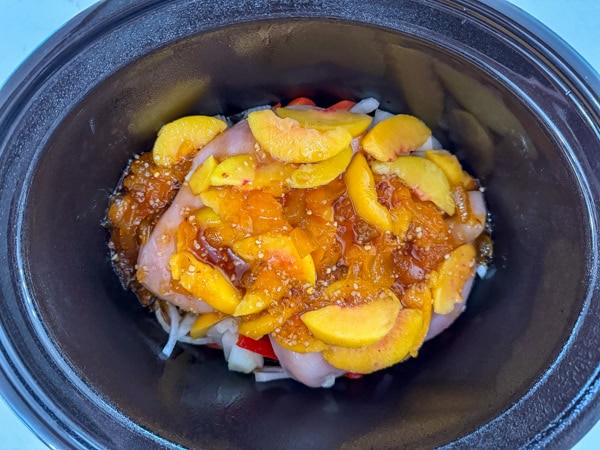 Everything in the crock pot ready to be turned on to cook.