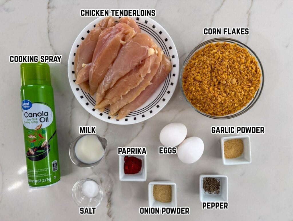 All of the ingredients needed to make the Crispy Baked Cornflake Chicken Strips recipe.
