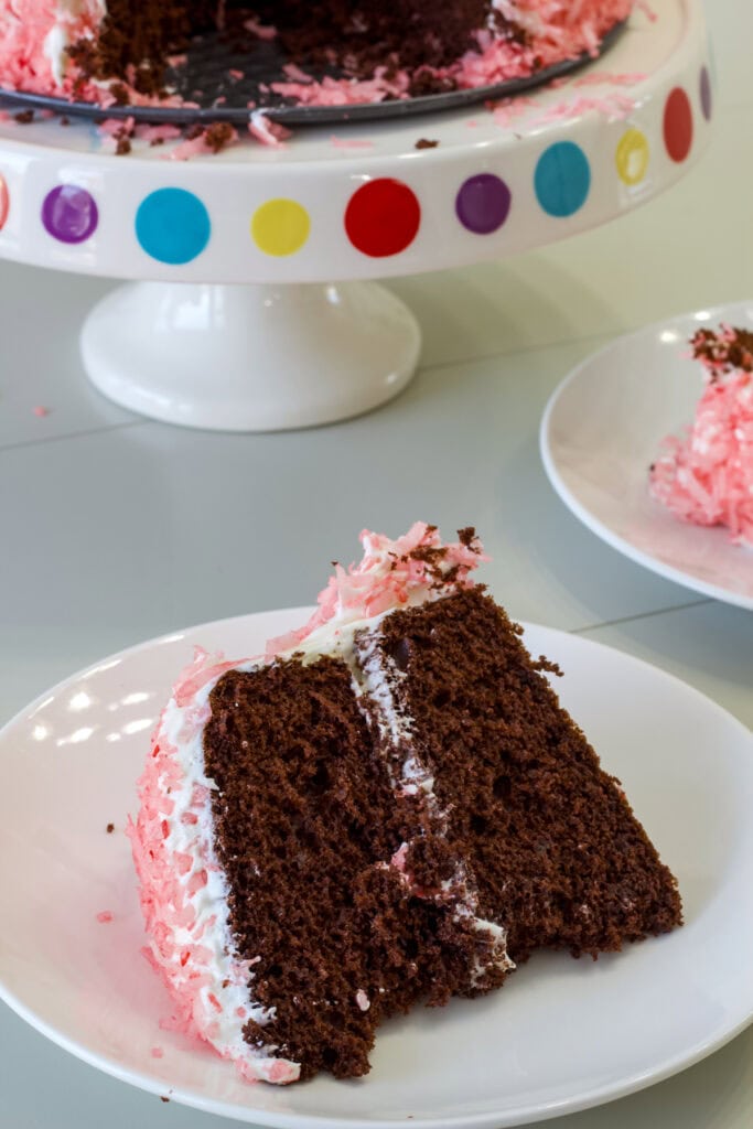 One piece of Easy Hostess Inspired Snoball Cake on a white plate.