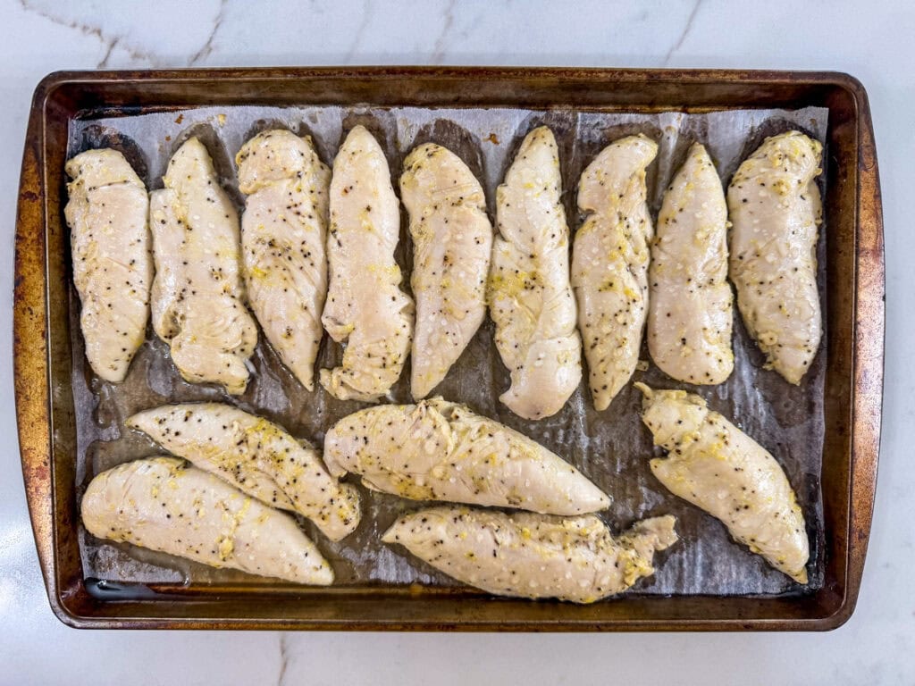 The Lemon Pepper Chicken Strips on the baking sheet after they came out of the oven.
