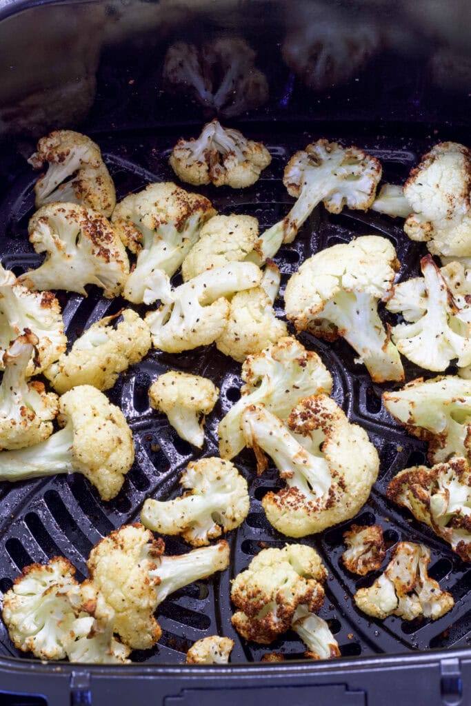 Crispy Air Fryer Cauliflower in the air fryer basket.