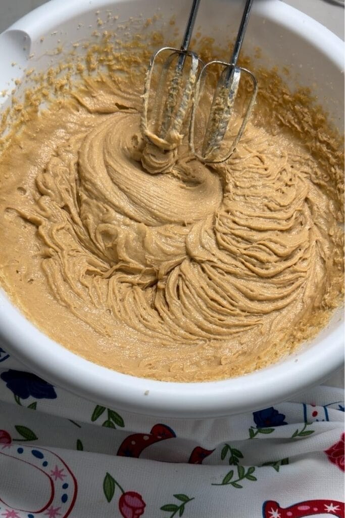 The eggs, vanilla and peanut butter added to the butter mixture.
