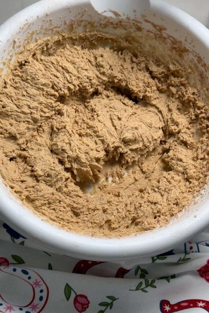 The dry ingredients added to the butter mixture.