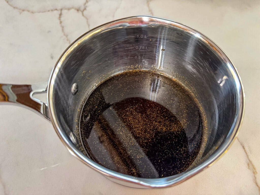 The reserved marinade in a small saucepan.